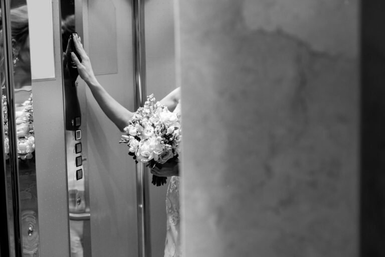 Gorgeous bride in hotel elevator