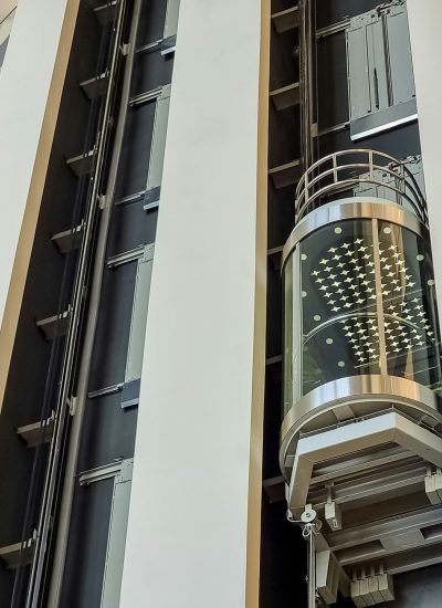 glass capsule elevator ,lift at luxury hotel or building.modern glass elevator to the upper floors